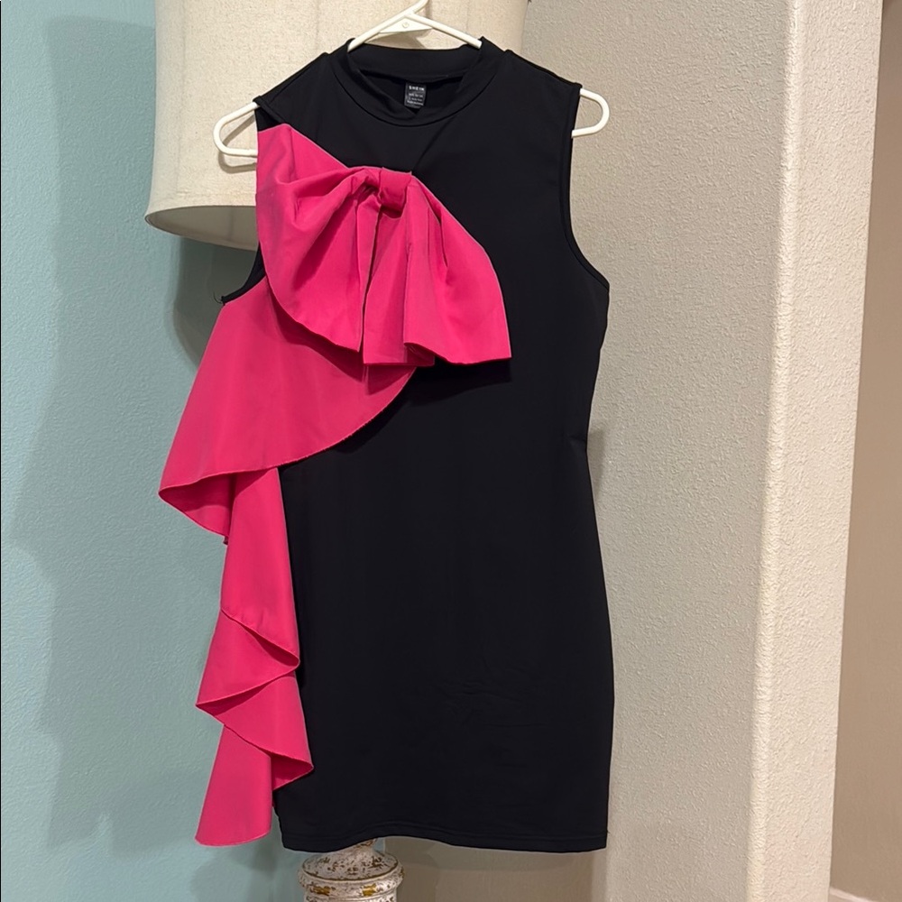 Chic Black Dress with Pink Bow Accent